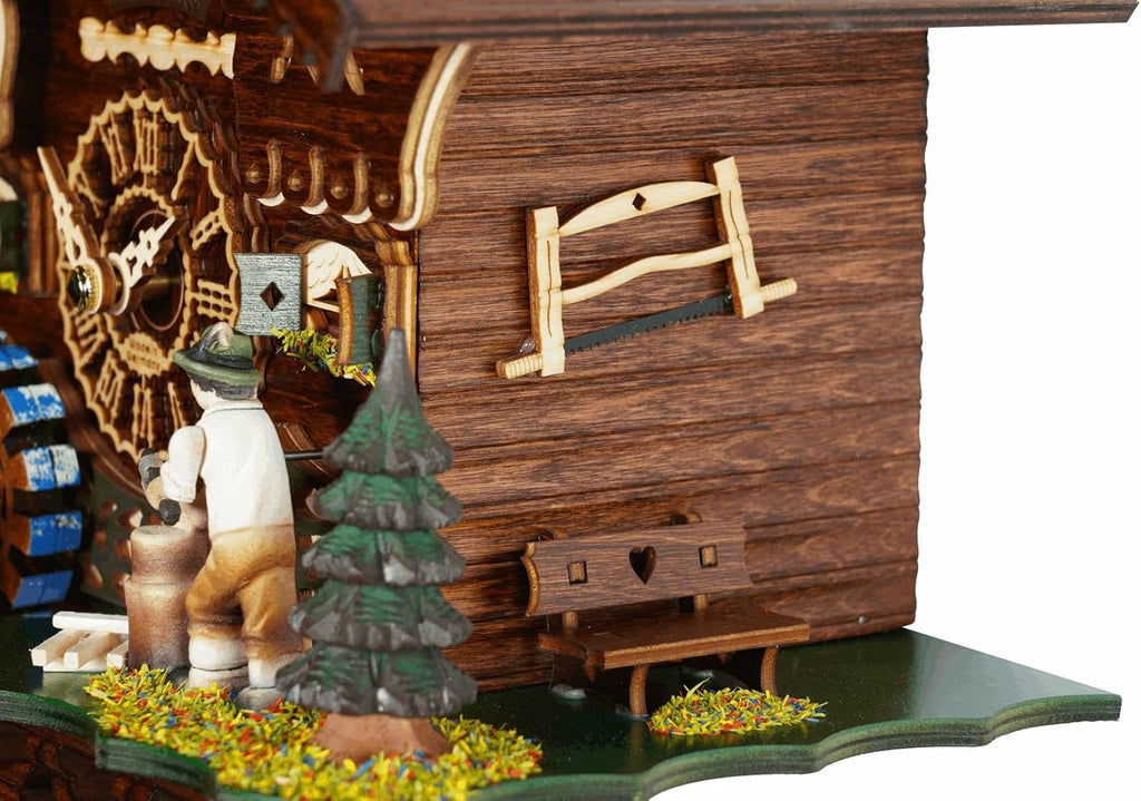 Trenkle Quartz Cuckoo Clock Black Forest House with Moving Wood Chopper and Mill Wheel, with Music TU 4217 QM