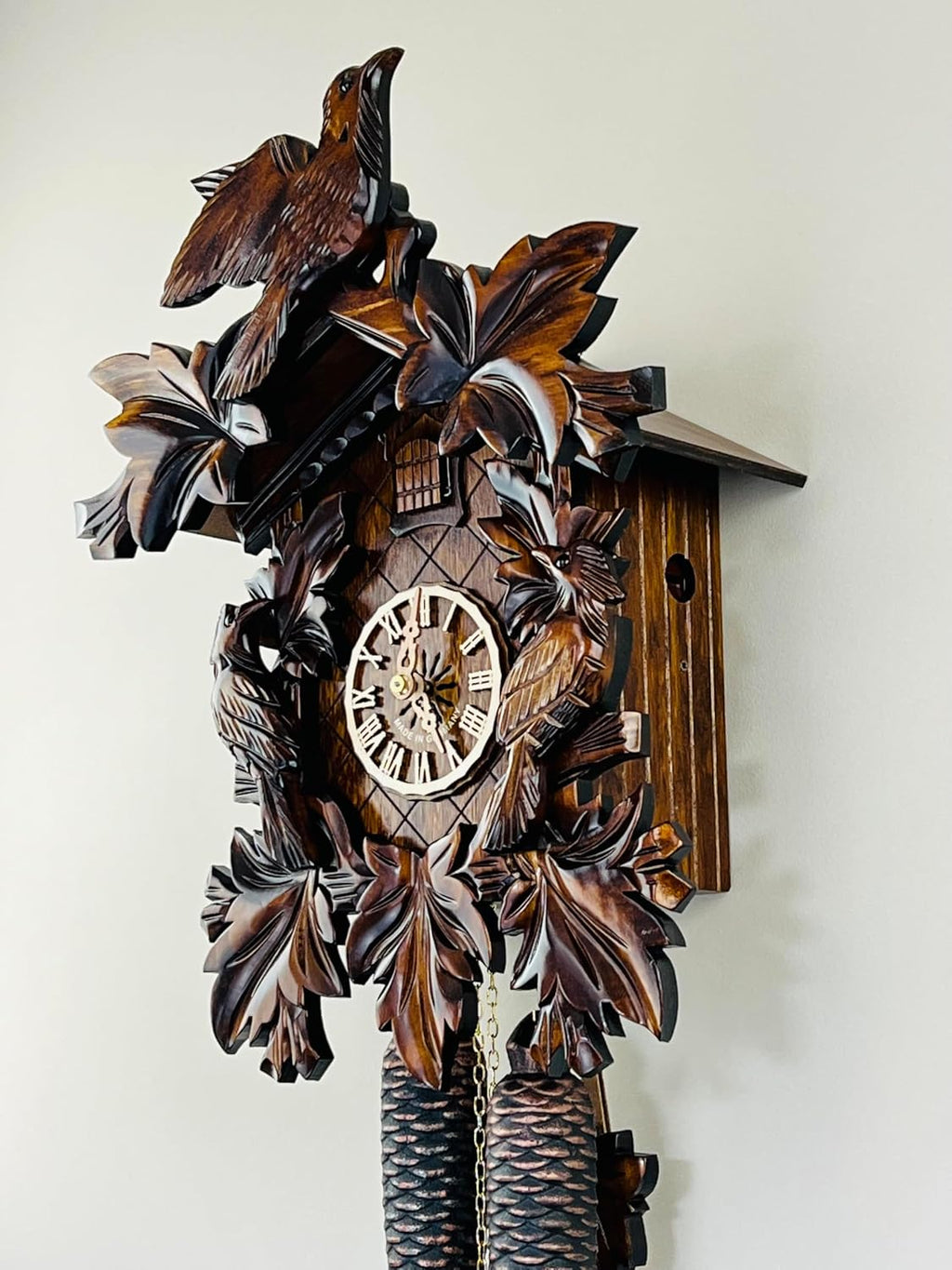 Eight Day Cuckoo Clock with Three Hand Carved Birds and Seven Leaves